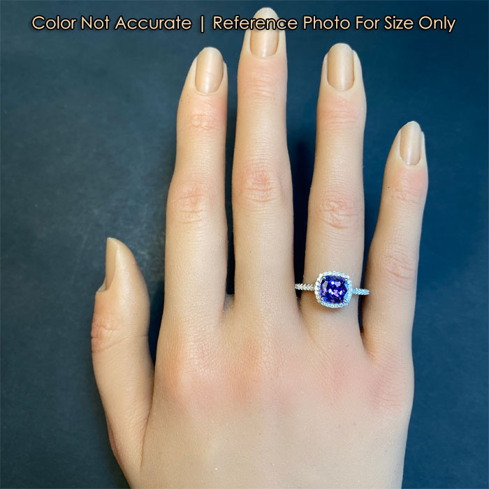 white gold tanzanite and diamond ring size on a hand