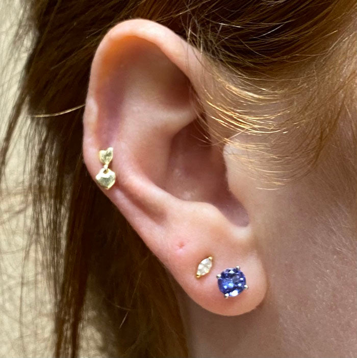 round cut tanzanite stud earring