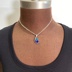 tanzanite and blue zircon pendant white gold diamond