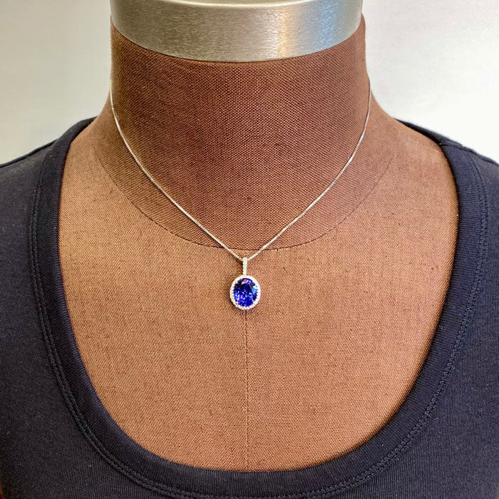 oval tanzanite and diamond pendant white gold