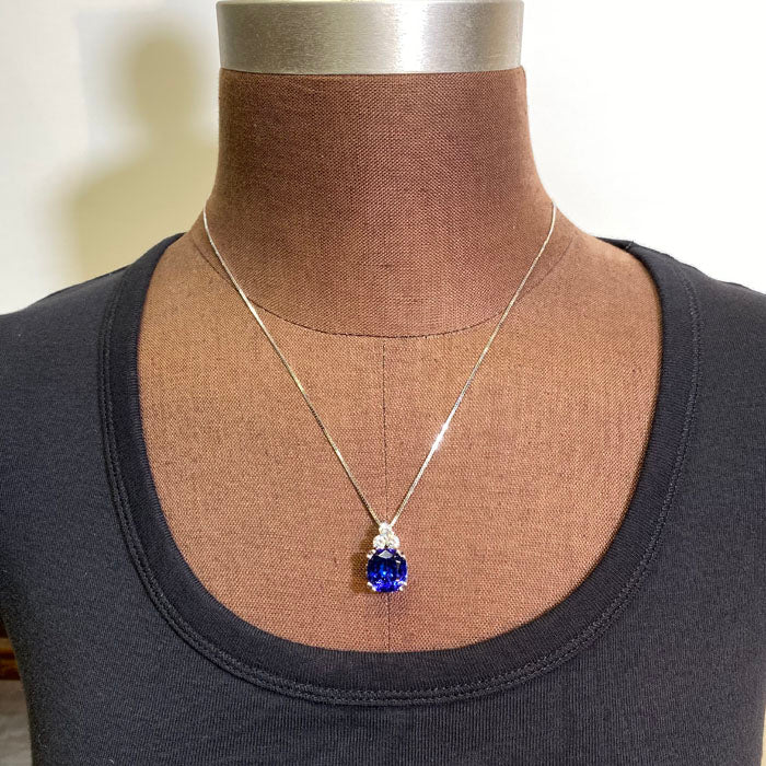 square cushion tanzanite three diamond accent