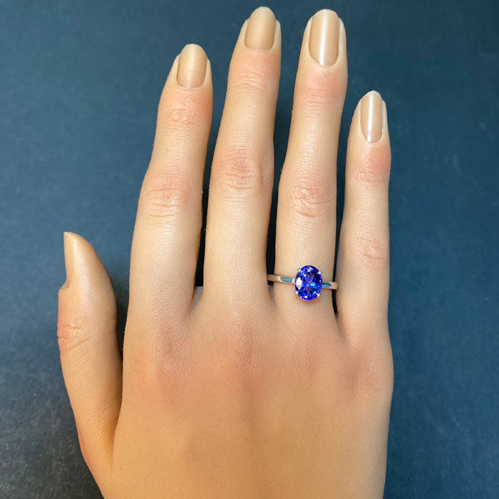 white gold tanzanite ring oval cut gemstone