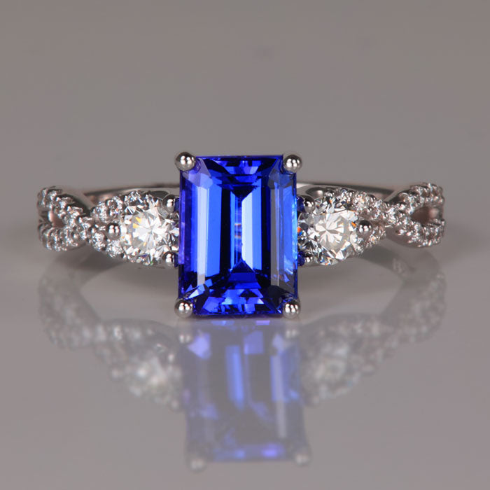 emerald cut tanzanite and diamond ring white gold