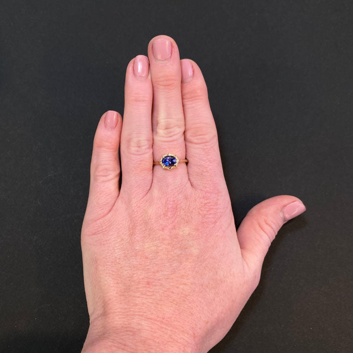 oval tanzanite ring yellow gold
