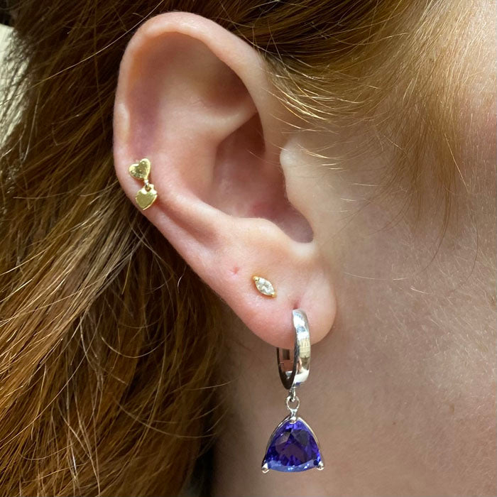 trilliant cut tanzanite huggie hoop earrings white gold