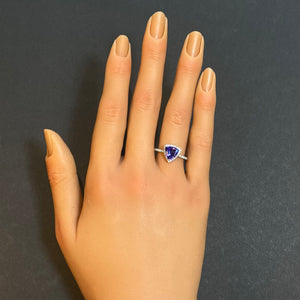 trilliant cut tanzanite ring with diamonds in white gold