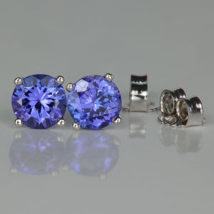 blue and violet tanzanite stud earrings
