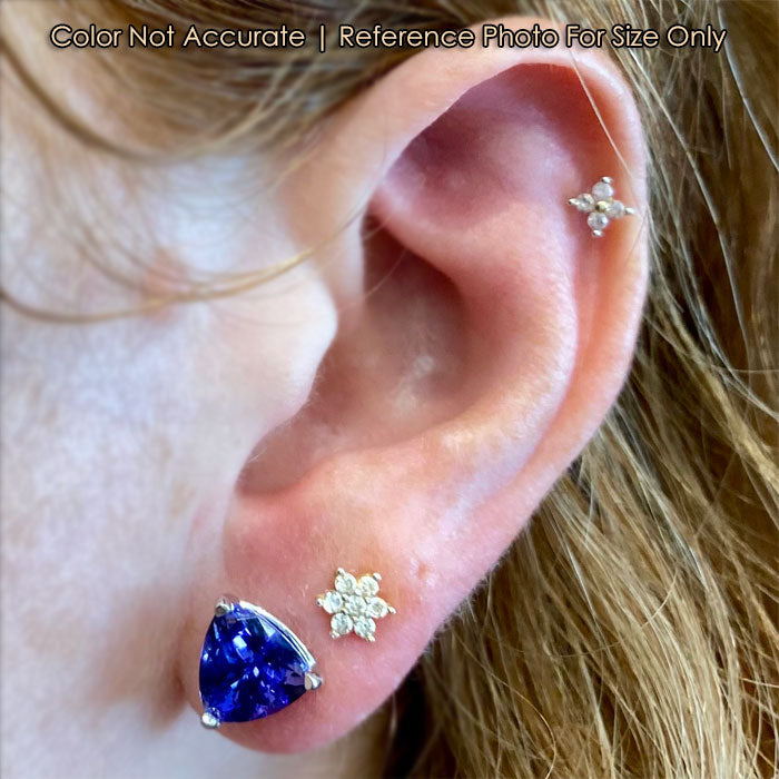 trilliant tanzanite white gold studs on ear