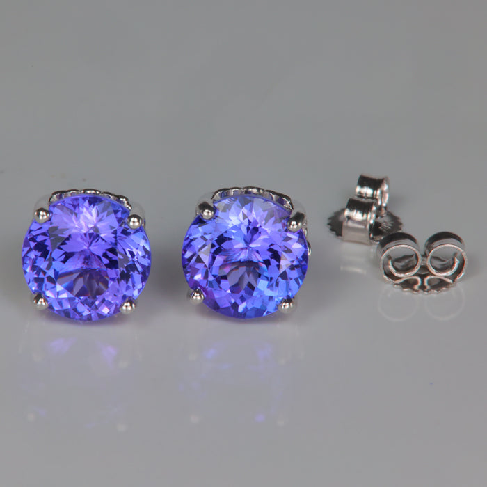 blue violet tanzanite gemstone earrings in white gold