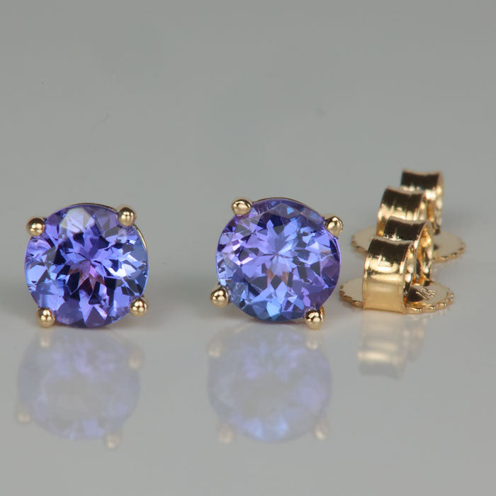 tanzanite studs in yellow gold round brilliant cut