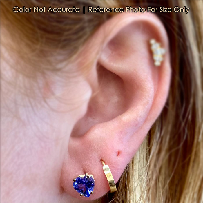 tanzanite heart shape earrings on ear