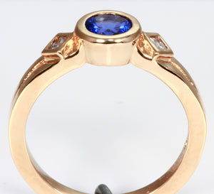 Tanzanite Ring in 18 kt. Yellow Gold With Fine Princess Diamonds