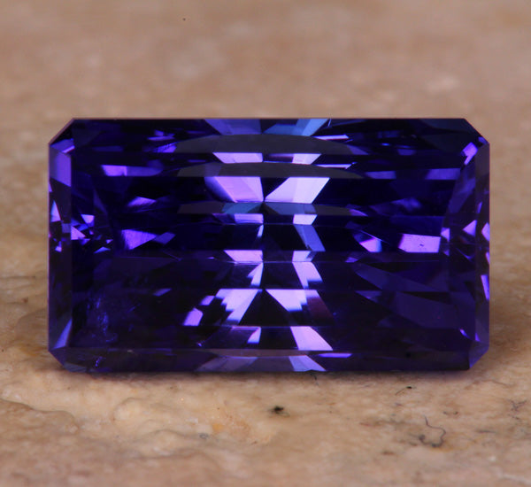 Wholesale Priced  6.36 Carat Brilliant Style Emerald Cut Tanzanite With Blue Violet Vivid Color