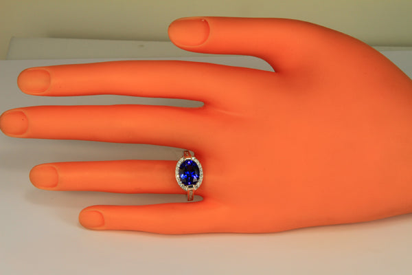 Superior Ring by Christopher Michael with Oval Tanzanite with Violet Blue Exceptional Plus Color