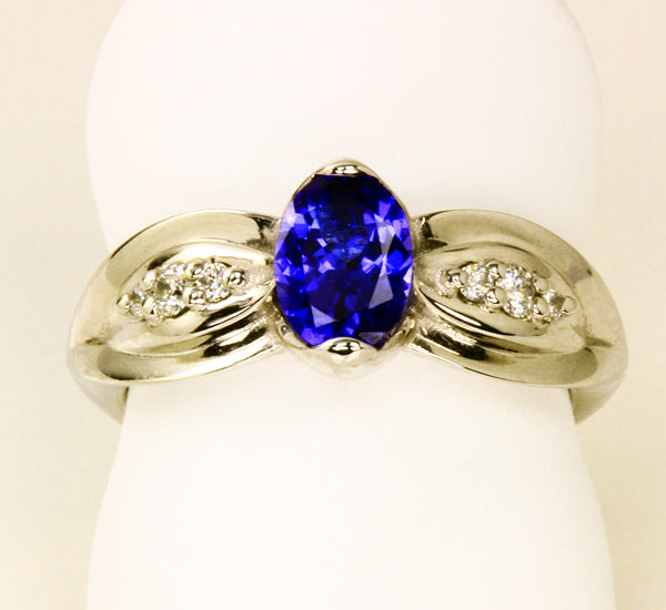 White Gold Tanzanite Ring With Intense Oval Tanzanite and Ideal Cut Diamonds