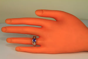 Custom Ring With Round Intense Colored Tanzanite