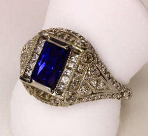 Antique Highly Detailed Ring with Emerald Cut Tanzanite