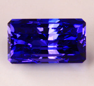 Wholesale Priced  6.36 Carat Brilliant Style Emerald Cut Tanzanite With Blue Violet Vivid Color