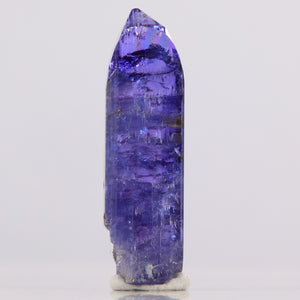 Tall purple tanzanite crystal specimen