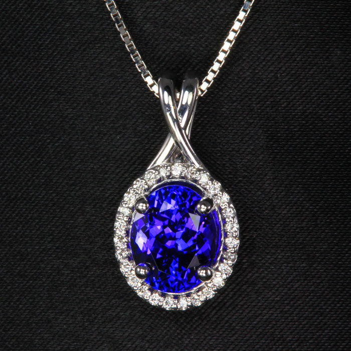 Halo Style Tanzanite & Diamond Pendant