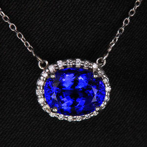 White Gold Oval Tanzanite and Diamond Halo Pendant 