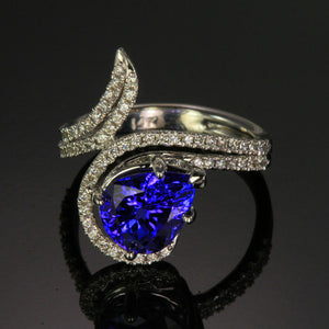 custom designed pear shaped tanzanite and diamond ring