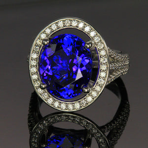 platium oval tanzanite and diamond halo ring