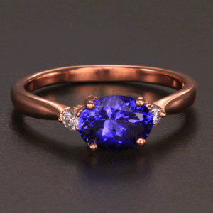 Rose Gold Oval Tanzanite and Diamond Ring