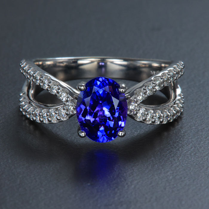 White Gold Oval Tanzanite and Double Shank Diamond Ring