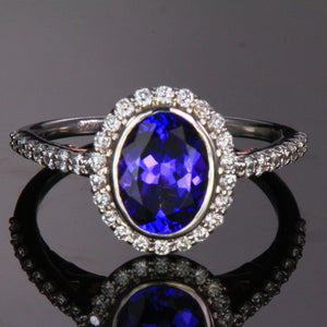 14K White and Rose Gold Oval Tanzanite Ring with Diamond Halo 2.09 Carats