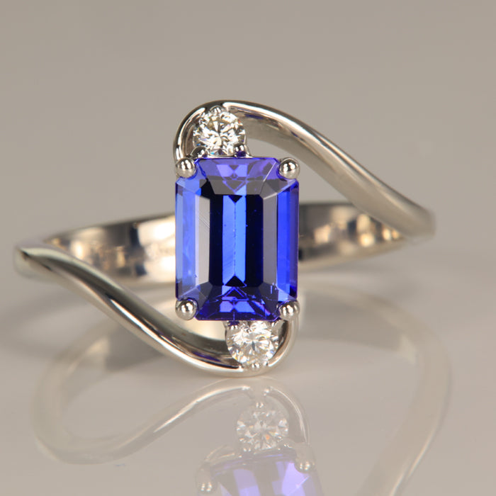 14K White Gold Emerald Cut Tanzanite Ring with Two Diamond Accents 1.90cts