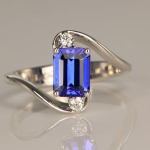 14K White Gold Emerald Cut Tanzanite Ring with Two Diamond Accents 1.90cts