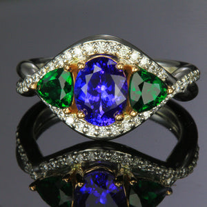 white and rose gold tanzanite and tsavorite ring