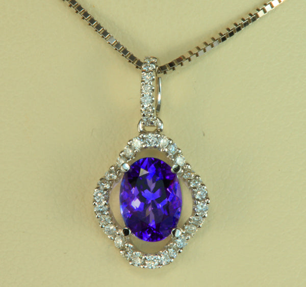White Gold Tanzanite Pendant With 8x6 mm. Vivid Color Oval 