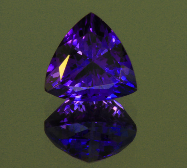 Trilliant Tanzanite with Blue Violet Vivid Color (May Grade Exceptional) 1.66 carats.