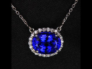 14K White Gold Oval Tanzanite and Diamond Halo Pendant 3.62 Carats