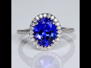 14K White Gold Oval Tanzanite an Diamond Halo Ring 3.10cts*