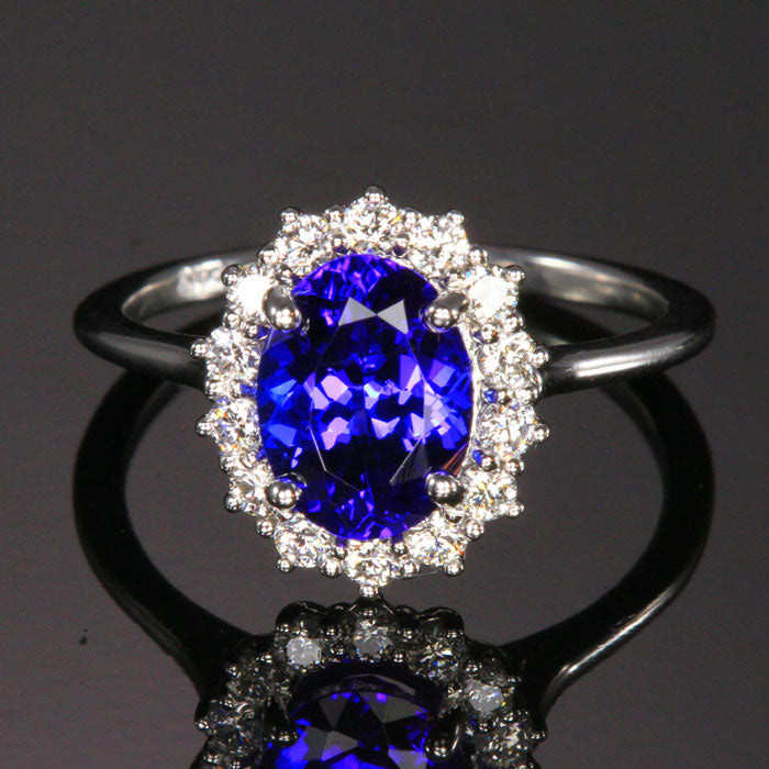  oval tanzanite and diamond halo ring 