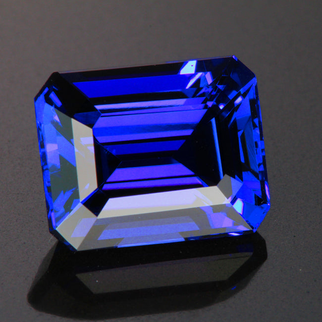 blue violet emerald cut tanzanite gemstone