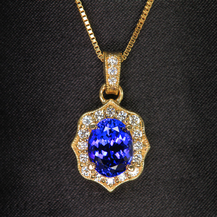 oval tanzanite diamond halo with diamond bail pendant
