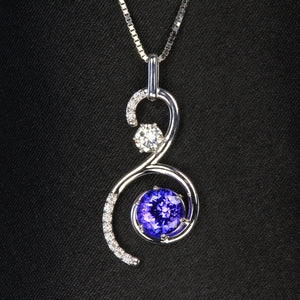 swirl tanzanite and diamond pendant