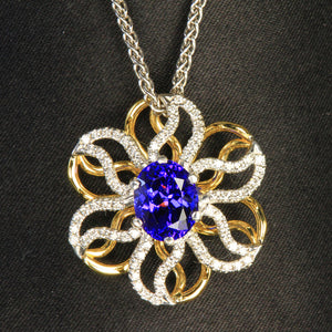 two tones yellow and white gold unique tanzanite and diamond pendat