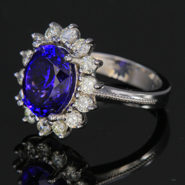 custom designed 18K White gold oval tanzanite and diamond halo ring