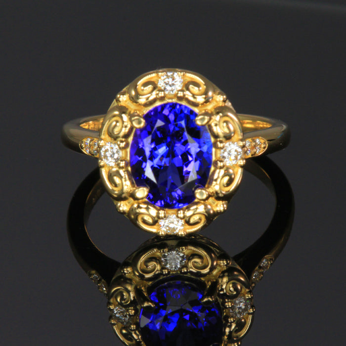 18k Yellow gold oval tanzanite and diamond ring